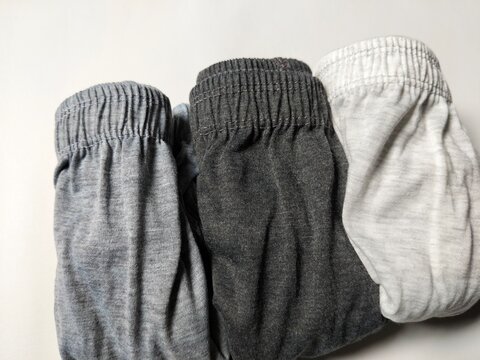 Neatly folded underwear organized in a clean arrangement, symbolizing personal care, clothing organization, fabric quality, household routine, and modern lifestyle. Excellent for retail catalogs, e-co