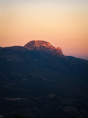 Golden hour sunset hitting mountain peak summit landscape Axarquia Granada Spain © Santiago