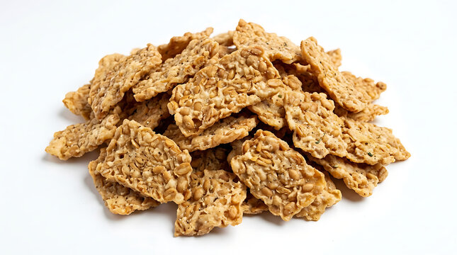 A pile of crispy cereal pieces on a surface for eating