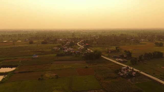 Golden Hour Aerial of Village and Dried Cornfields in Nepal , Haldibaari Jhapa