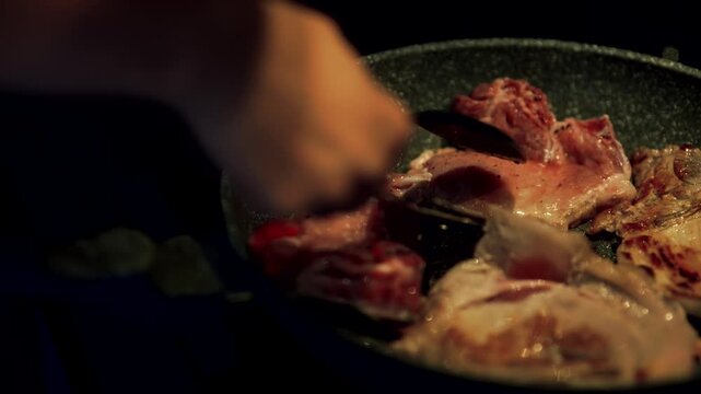 Flipping Juicy Meat Steaks Frying In Hot Nonstick Pan. Cooking Dinner Meal At Kitchen