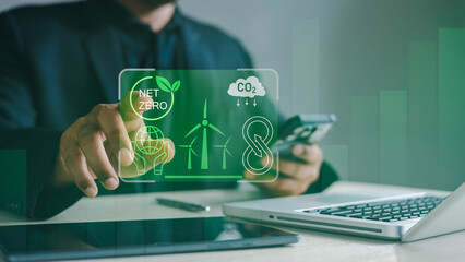 carbon capture storage.Business professional using digital interface to illustrate net zero, carbon capture, renewable energy, and sustainability strategy for climate action and ESG transformation. © DK_STUDIO