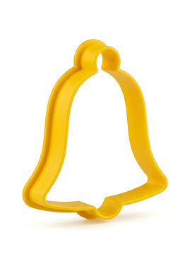 Yellow bell shaped cookie cutter isolated