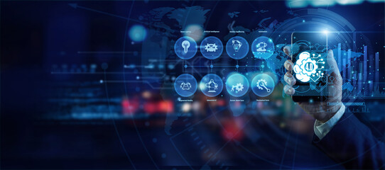 Fototapeta premium Factory manager holding a mobile phone analyzing global Industry 4.0 data on a holographic world map. Futuristic technology, secure network connections, and advanced data visualization.