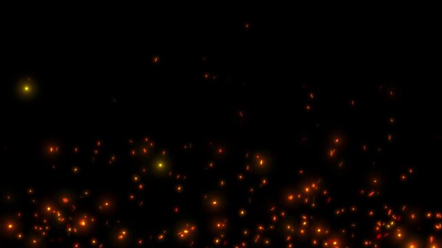 Burning Fire Sparks and Glowing Embers Motion effect video on black background.