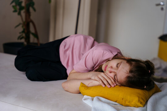 Girl is sleeping on the couch