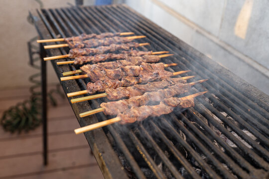 Grilling Skewers on a Barbecue Grill for a Tasty Meal