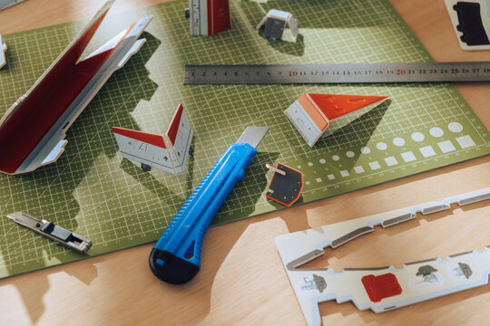 Cutting board with model parts.
