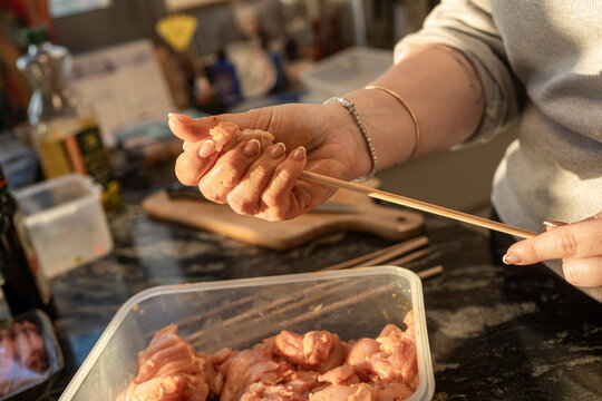Preparing Chicken Skewers in the Kitchen for a Meal