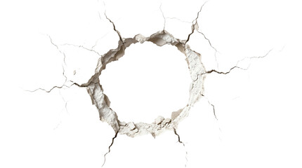 A circular hole with cracked edges on a concrete wall, revealing depth and destruction.
