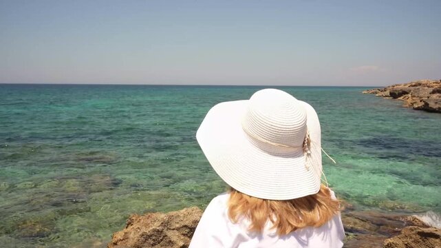 Senior Woman Contemplating the Mediterranean Sea