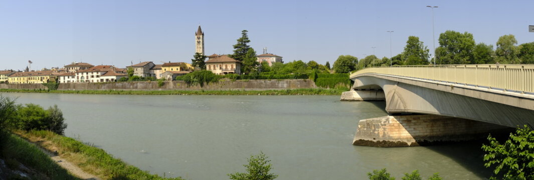 Scenic urban panorama of Verona with Adige river and modern concrete bridge