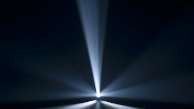 A single bright light source emits radiant beams across a dark void  creating an abstract and serene visual composition
