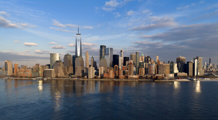 Fototapeta premium New York City skyline with skyscrapers. Manhattan aerial cityscape in NYC New York. New York downtown panorama. NYC Manhattan skyline.