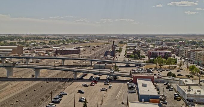 Cheyenne Wyoming Aerial v1 orbiting shot of downtown cityscape with drone flying above central avenue and warren avenue from union pacific railroad - Shot with Inspire 2, X7 camera - August 2020