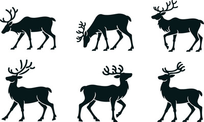 Set of reindeer or deer silhouettes in various poses and antler shapes on white background © Kahima