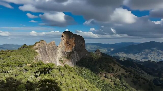 Pedra do Ba&uacute; in S&atilde;o Bento do Sapuca&iacute; in aerial view. Rock climbing site. Atlantic Forrest. Time lapse.