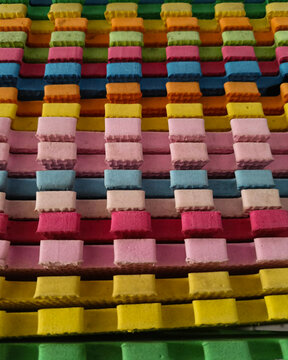 Full frame background of colorful stacked EVA foam puzzle mats texture