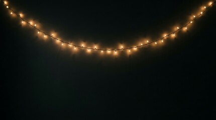 Naklejka premium Curved String of Warm Fairy Lights on Dark Background