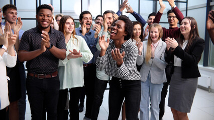 Business people clapping their hands after a seminar