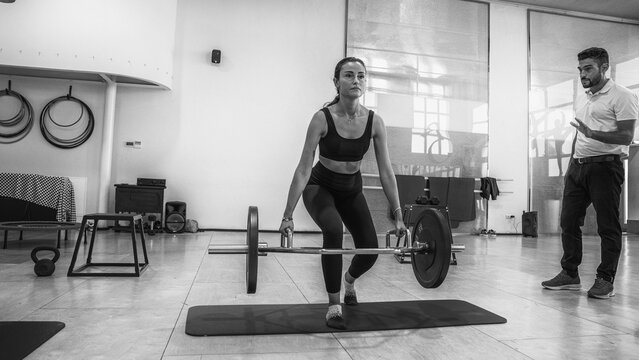 Physical rehabilitation exercises with weights in the gymnasium