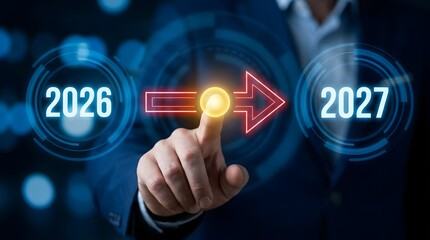 Fototapeta premium Business forecast 2026 to 2027 hand pressing forward on digital interface