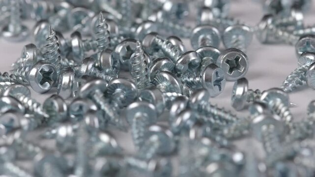 Metal mounting screws close-up. Macro image.