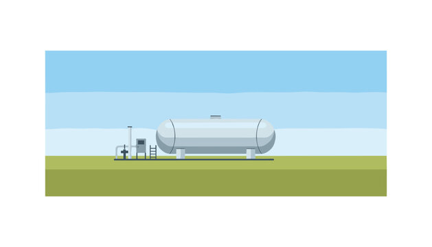 Large horizontal metal storage tank positioned on a flat green field under a clear blue sky, designed for industrial gas or liquid storage.
