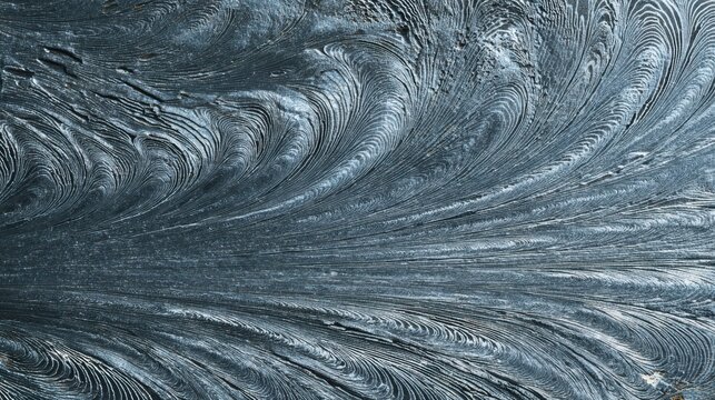 Detailed macro view of a dark Damascus steel texture with intricate swirling patterns and fine metallic ridges