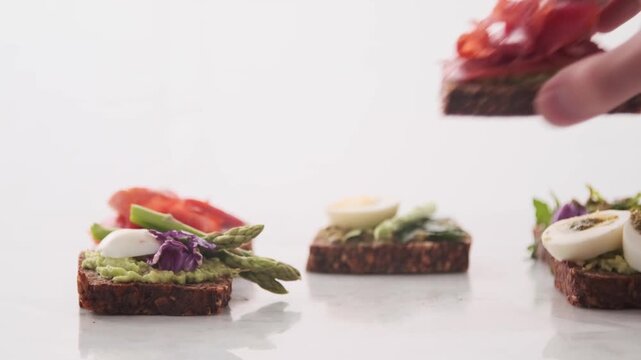 vegetable tartine, fresh salad, toasted bread, colorful vegetables, sliced avocado, cherry tomatoes, young greens, cucumber rounds, red radish, red onion, fresh cheese, aromatic herbs, 