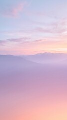 Obraz premium Dreamy Pastel Sunset Over Foggy Mountains Minimalist Landscape