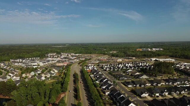 Aerial flyover shot of new Wendell Falls housing development in Wendell, North Carolina, near Raleigh