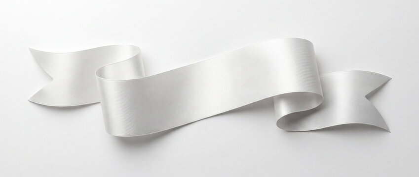 Premium flowing white silk ribbon banner isolated on a clean background, featuring elegant smooth folds and a glossy texture, perfect for luxury wedding invitations or festive gift wrapping