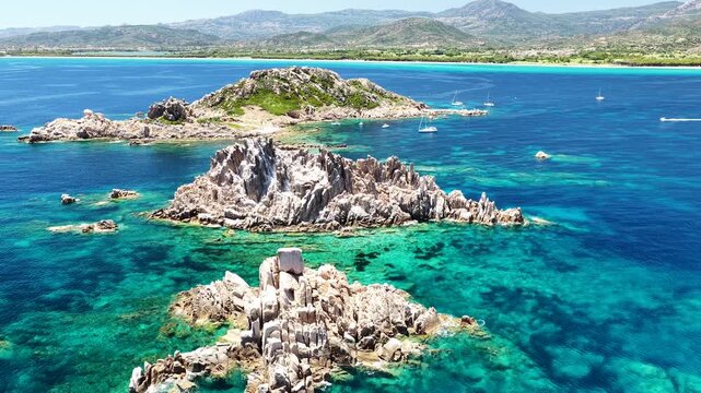 Aerial drone view of Isolotto d'Ogliastra with turquoise sea, Lotzorai, Ogliastra, Sardinia, Italy