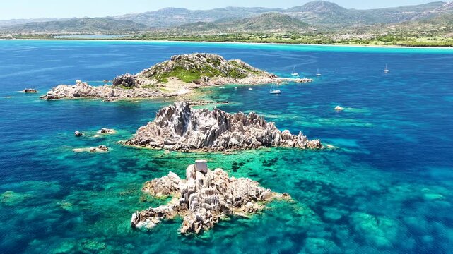 Aerial drone view of Isolotto d'Ogliastra with turquoise sea, Lotzorai, Ogliastra, Sardinia, Italy