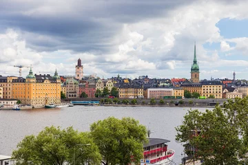 Stockholm Kornhamnstorg Square in Gamla Stan with German Church Tower © Reelistic