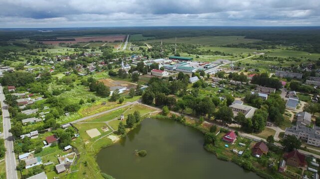 Aerial view of Dmitrova Gora village in Tver region with a scenic lake