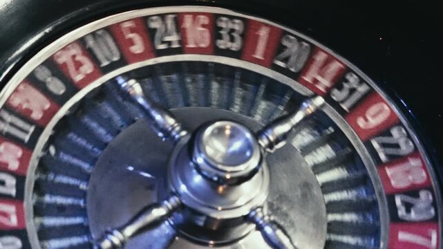 Top View of a Spinning Casino Roulette Wheel with Symmetrical Composition