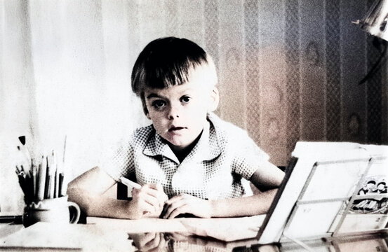Young Child Sitting at a Table in Dnipropetrovsk, Ukraine, September 1971