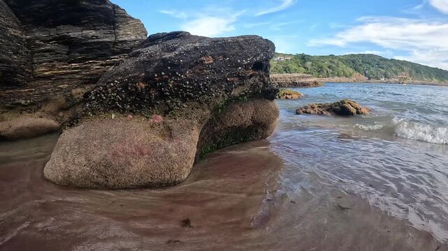 Beach Footage &ndash; Waves Washing Over Coastal Rocks at Praia do Forno, B&uacute;zios, Brazil