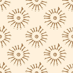 Fototapeta premium Boho seamless pattern with abstract ethnic sun elements in earthy ochre color on beige background