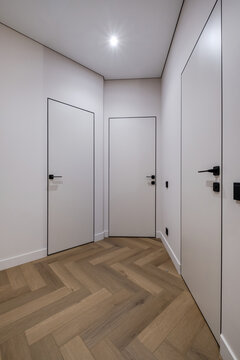 long empty corridor in interior of entrance hall of modern apartments, office or clinic