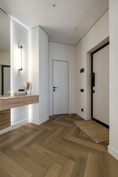 long empty corridor in interior of entrance hall of modern apartments, office or clinic
