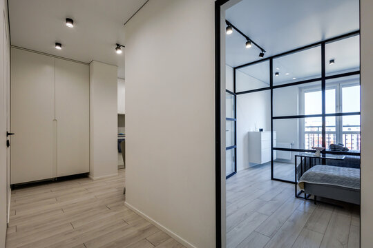 long empty corridor in interior of entrance hall of modern apartments, office or clinic