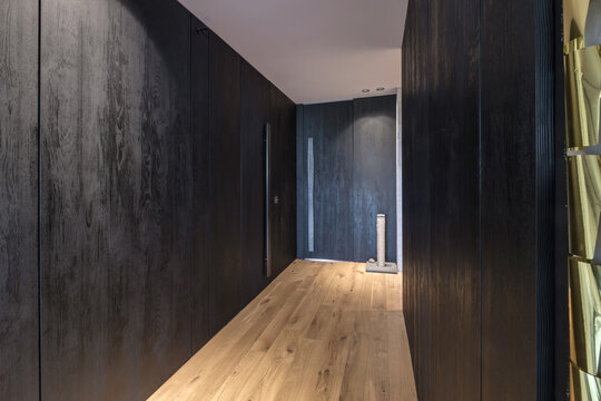 long empty corridor in interior of entrance hall of modern apartments, office or clinic