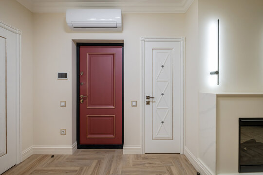 long empty corridor in interior of entrance hall of modern apartments, office or clinic