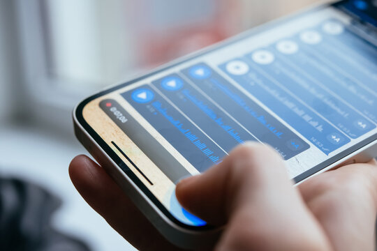 A person recording voice messages in a messenger.