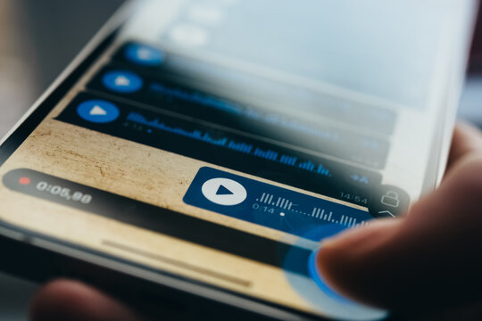 A person recording voice messages in a messenger.