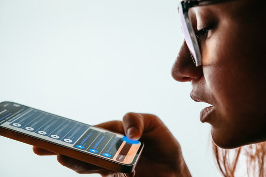 A person recording voice messages in a messenger.