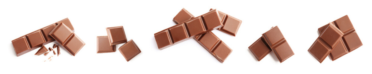 Fototapeta premium Milk chocolate pieces isolated on white, set. Top view